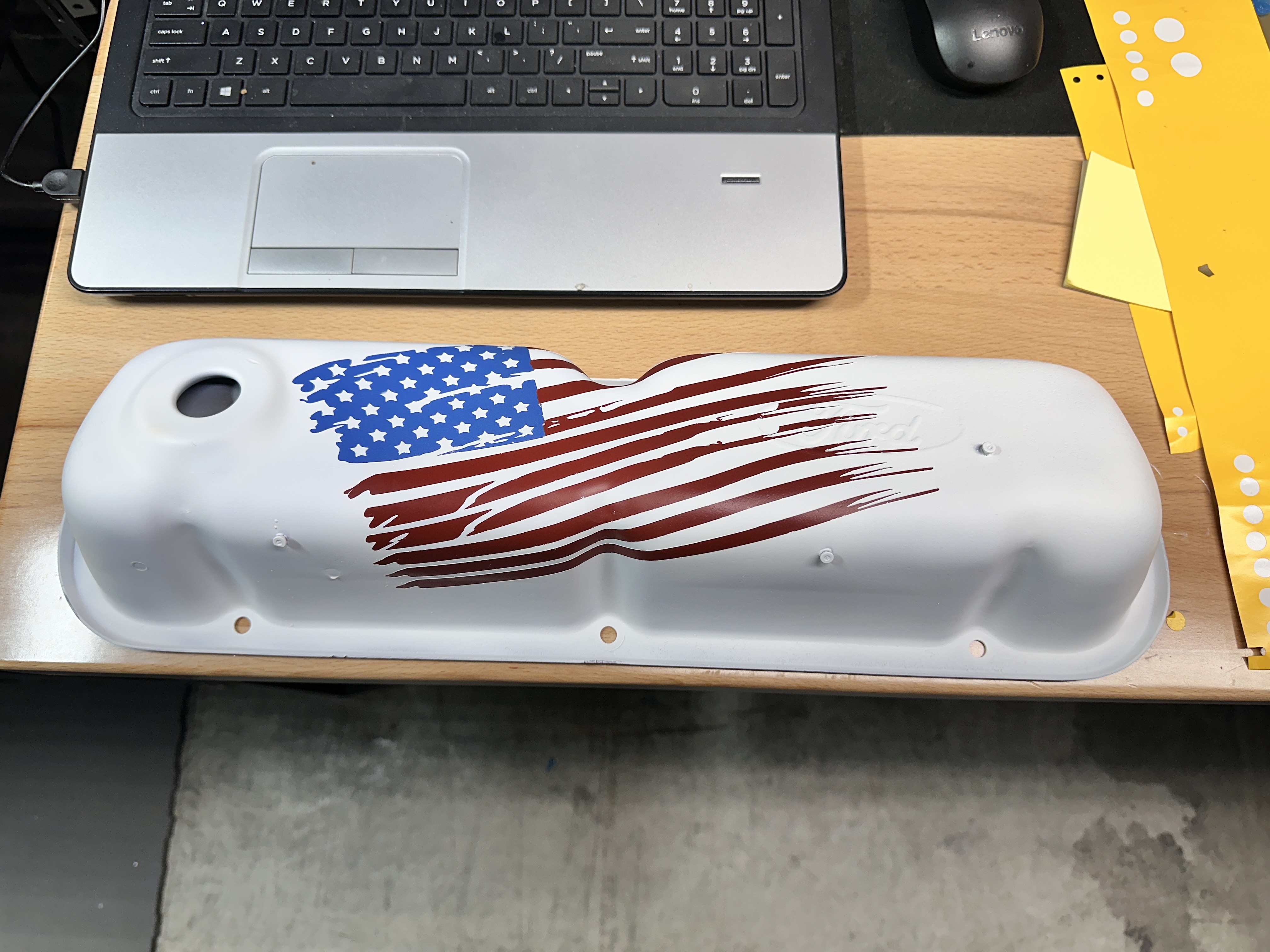 Valve cover finished in Cerakote with American flag laser design
