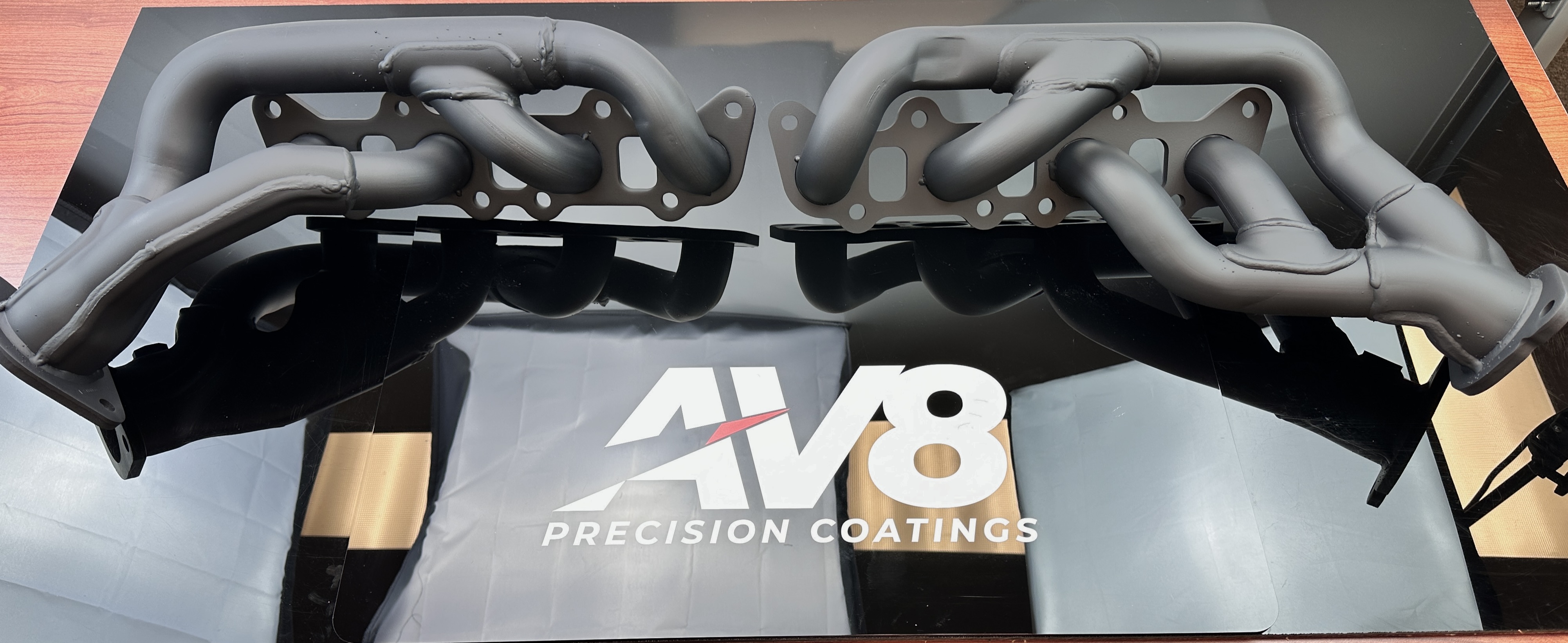 Cerakote exhaust headers finished in Graphite Black on AV8 display